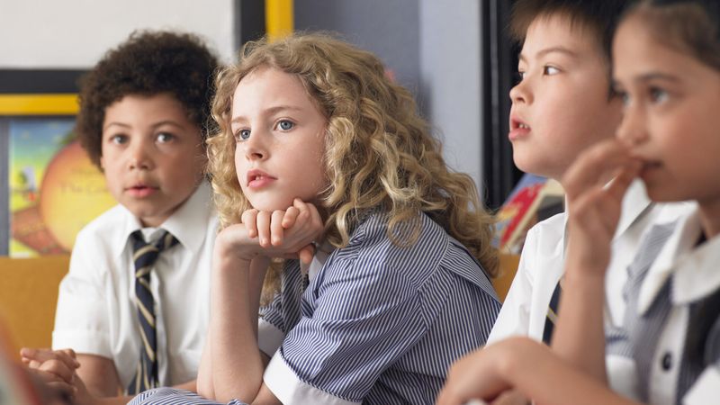 Photo of school children listening